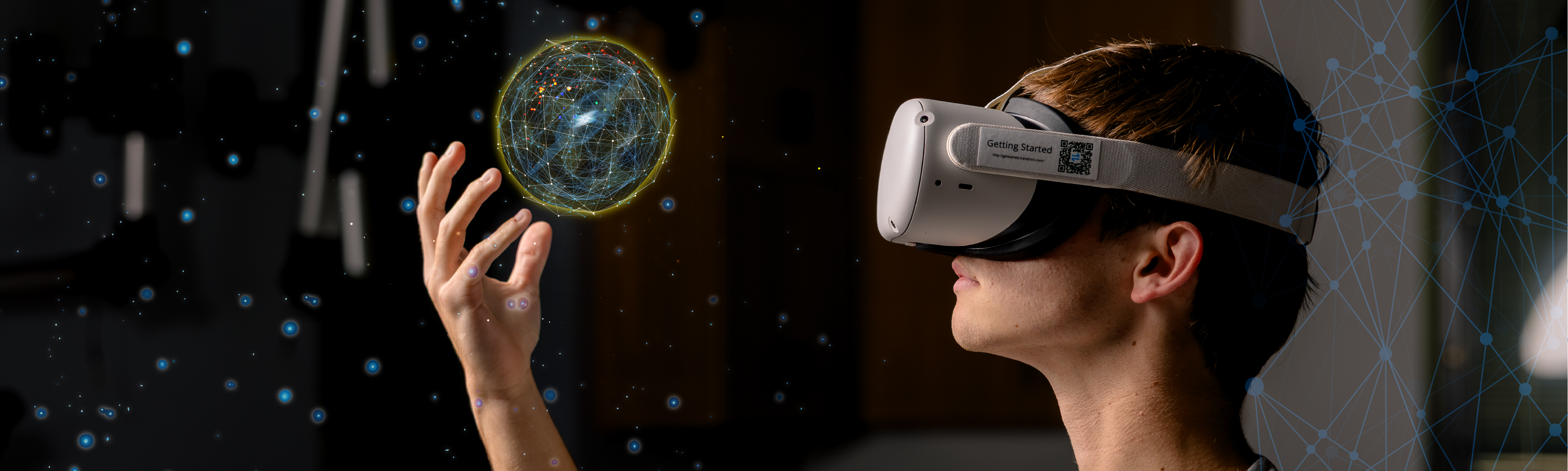 TSC student wearing VR headset and surrounded by blue light technology graphics.