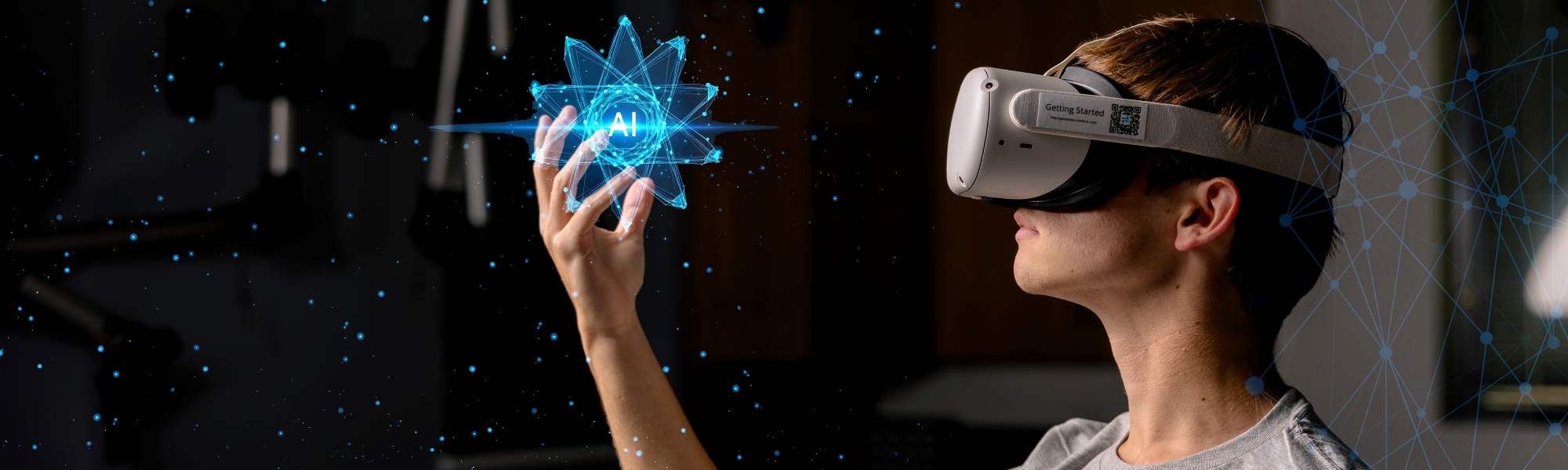 TSC student wearing VR headset and surrounded by blue light technology graphics.