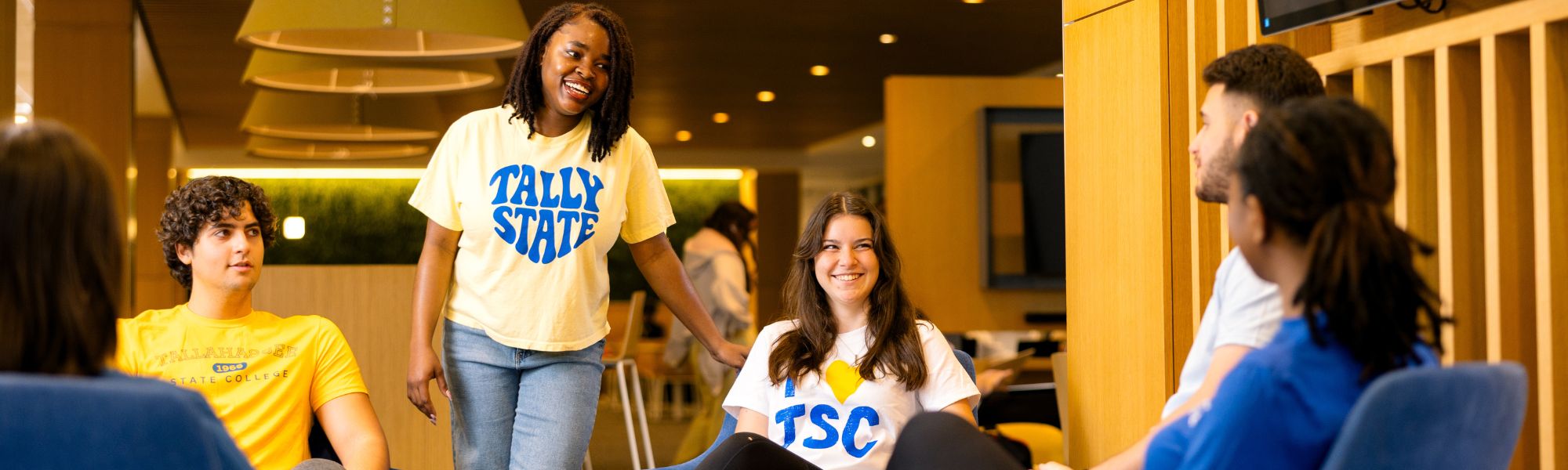 TSC students hanging out in Student Union sitting area.