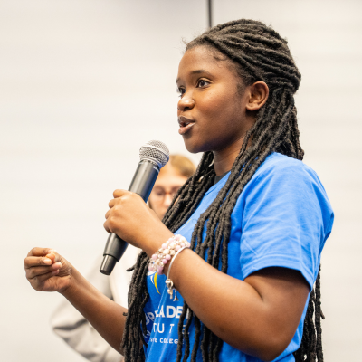 fli student with microphone