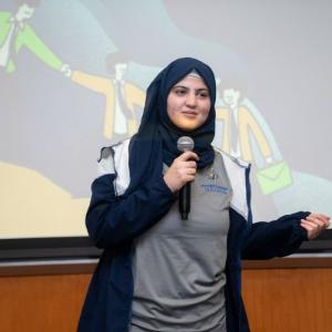 Future Leader Institute Member presenting at conference.