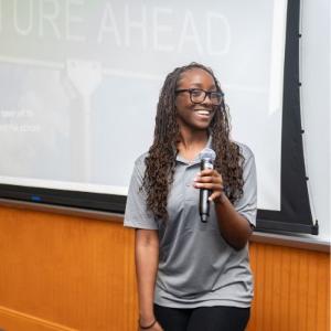 Future Leader Institute Member presenting at conference.