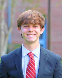 A young man smiling